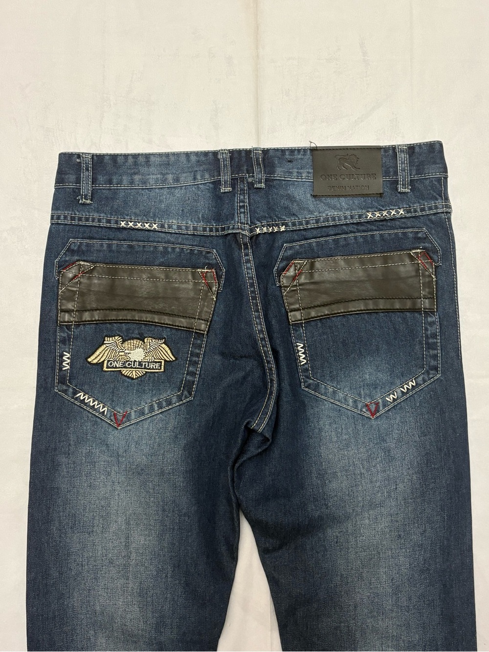Y2K 2000s style Embroidered Patch Blue Ripped Jeans | $50